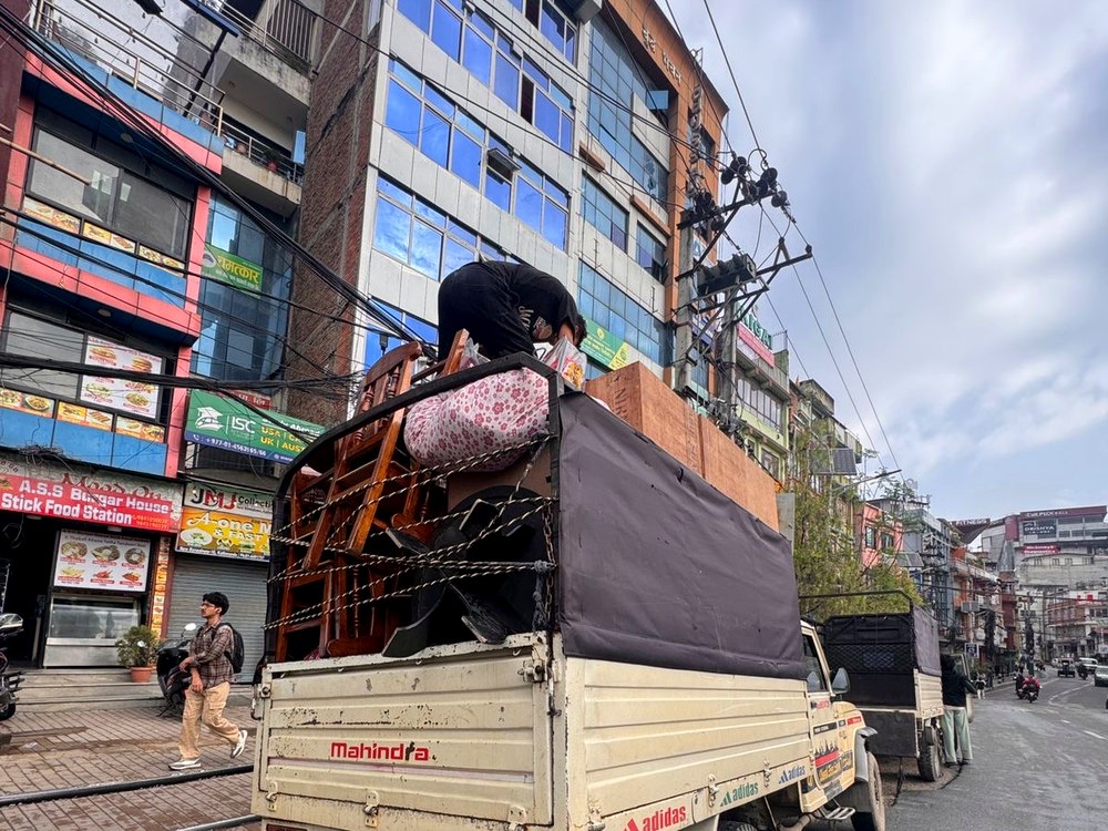 Furniture loaded on truck on a busy Kathmandu street